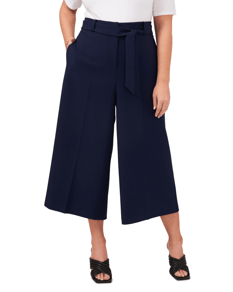Front of a model wearing a size 14W Ivy Belted Cullote in CLASSIC NAVY by Vince Camuto. | dia_product_style_image_id:261846